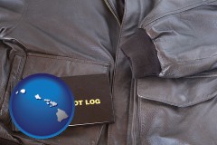 hawaii map icon and an leather aviator jacket and pilot log book