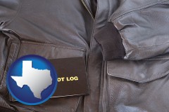 texas map icon and an leather aviator jacket and pilot log book