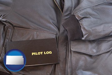 an leather aviator jacket and pilot log book - with Kansas icon