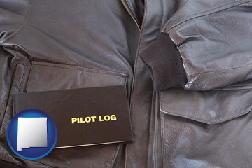 an leather aviator jacket and pilot log book - with New Mexico icon