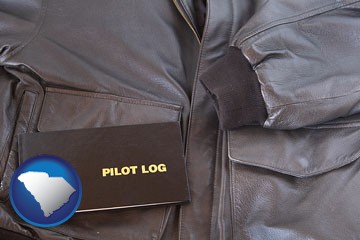 an leather aviator jacket and pilot log book - with South Carolina icon