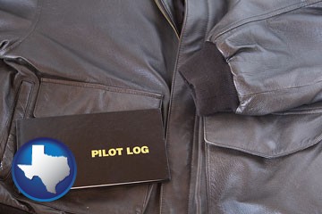 an leather aviator jacket and pilot log book - with Texas icon